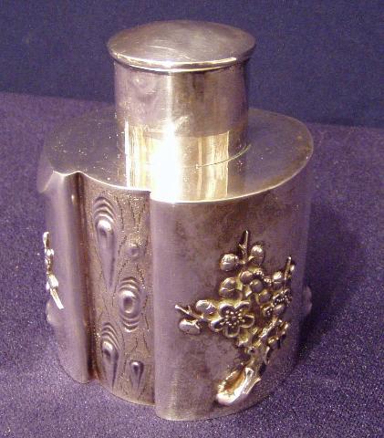 900F Tea Caddy in mirror finish w/cast and applied Prunus Decoration