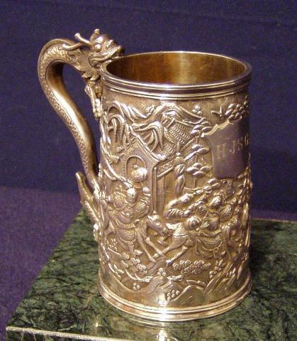900F double skinned Dragon handled Mug w/ decoration of war and plunder