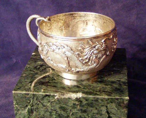 Silver cup w/serpent handle