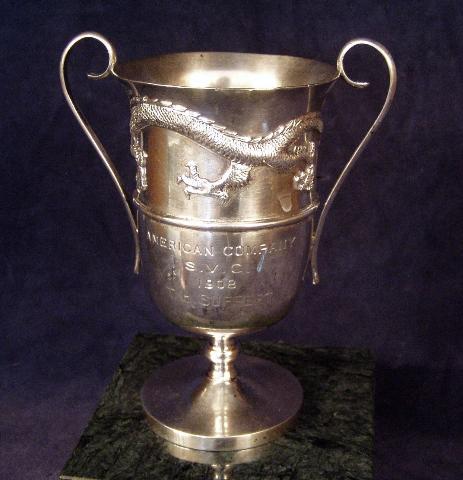 Trophy Cup w/cast and applied four toed dragon